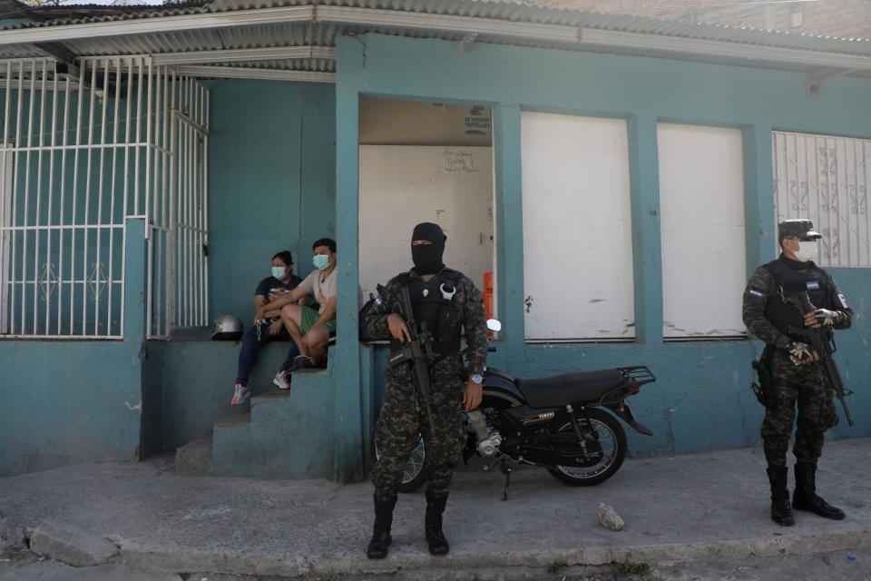 Soldiers enforce a curfew in Tegucigalpa, Honduras.