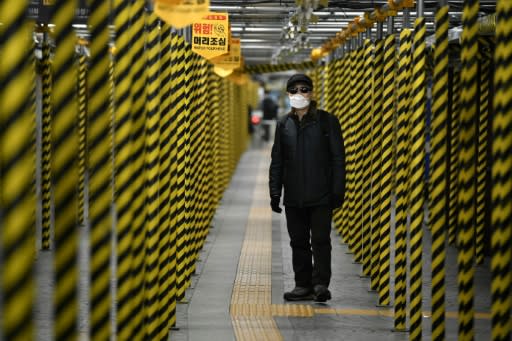 A man walks at a subway station that is being renovated in Seoul on February 22