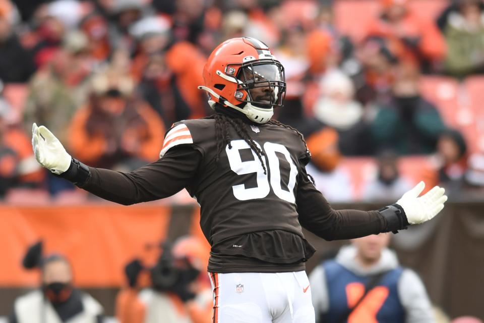 Defensive end Jadeveon Clowney (90) is happy to be back with the Browns after signing a free-agent contract Wednesday. [Nick Cammett/Associated Press]