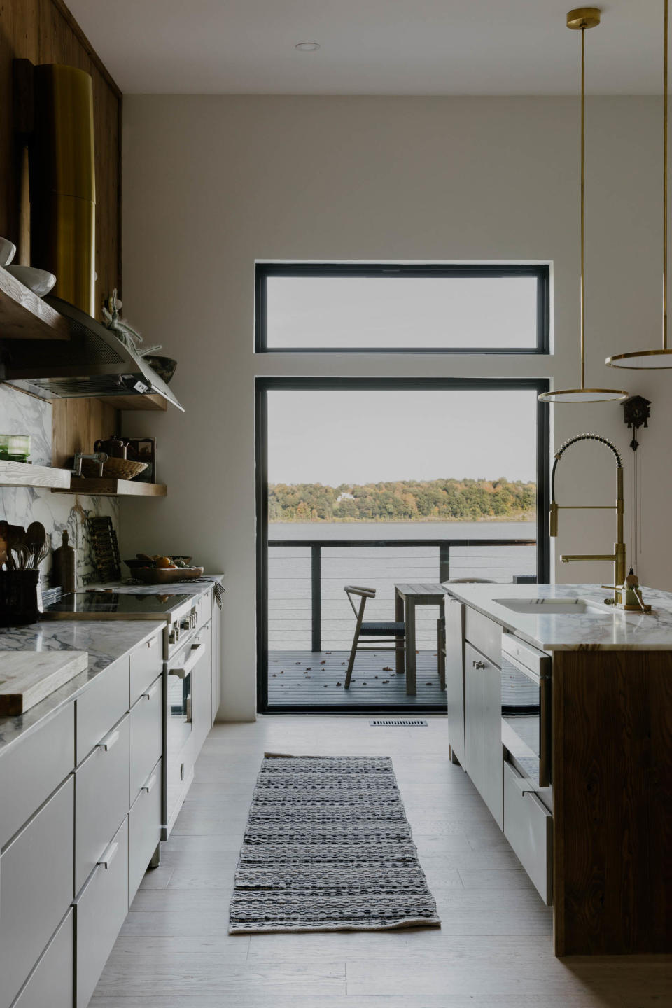 Adding storage and functionality was a main priority in the kitchen with custom cabinetry and a dual-island system.