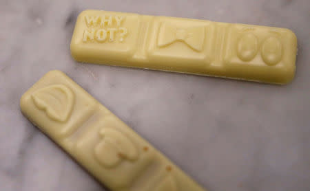 Bars of Nestle's new 'Milkybar Wowsomes' are displayed on a table at their Product Technology Centre in York, Britain, March 21, 2018. REUTERS/Phil Noble