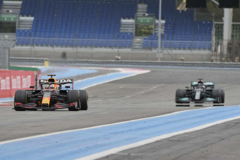 Red Bull driver Max Verstappen of the Netherlands before crossing the finish line to win the French Formula One during the Grand Prix at the Paul Ricard racetrack in Le Castellet, southern France, Sunday, June 20, 2021. (AP Photo/Francois Mori)