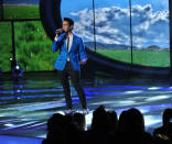 Lazaro Arbos performs Kelly Clarkson's "Breakaway" on the Wednesday, March 13 episode of "American Idol."