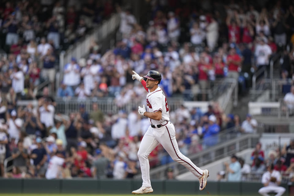 Atlanta Braves' Matt Olson celebrates after hitting a two-run home run in the first inning of a baseball game against the Philadelphia Phillies, Sunday, May 28, 2023, in Atlanta. (AP Photo/Brynn Anderson)