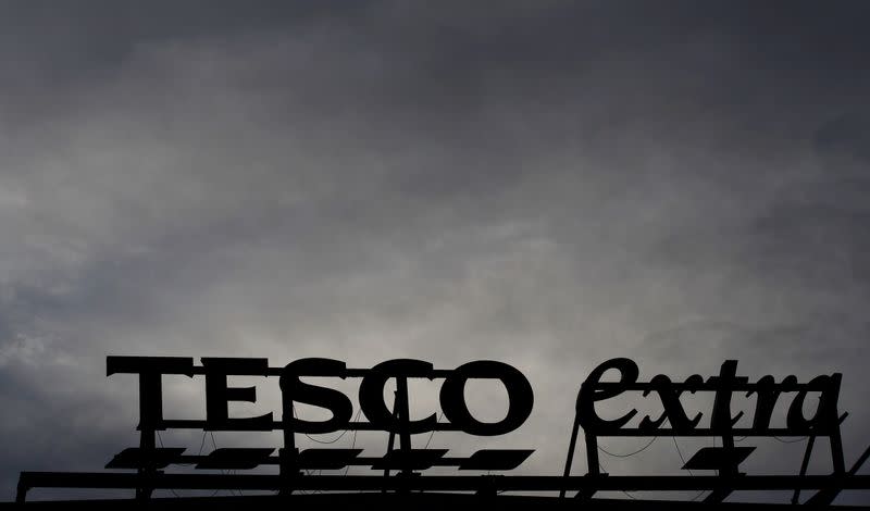 FILE PHOTO: Signage is seen outside a Tesco extra superstore near Manchester