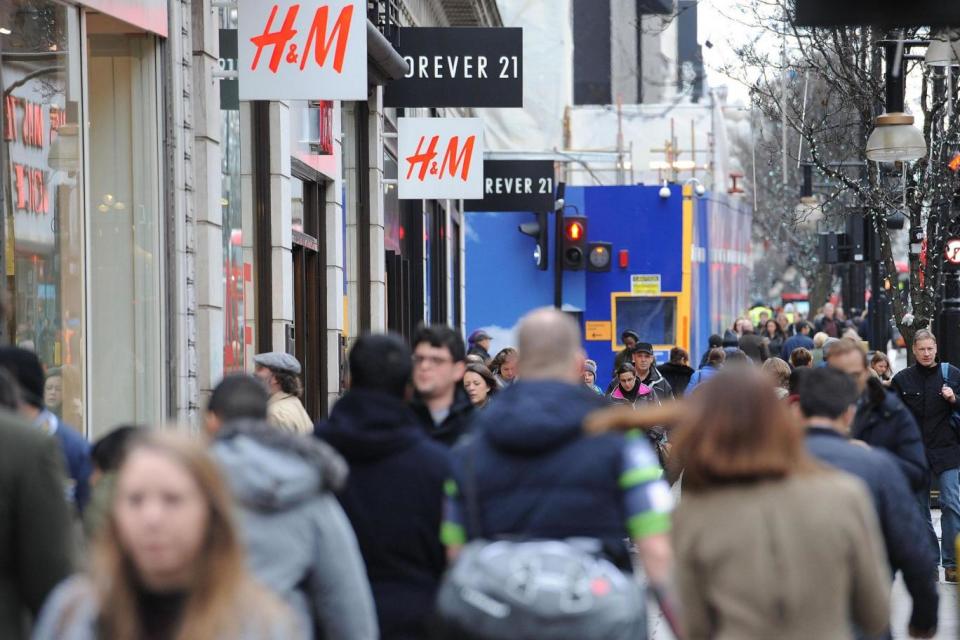 Shoppers on Oxford Street in central London (PA)