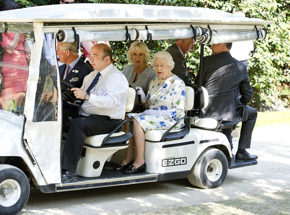 The Queen used a golf cart on the first day of the Coronation Festival in 2013. (Getty Images)