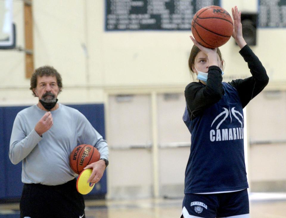 Gabriela Jaquez shoots a free throw while head coach Mike Prewitt looks on during Camarillo High's practice on Tuesday, Jan. 18, 2022.