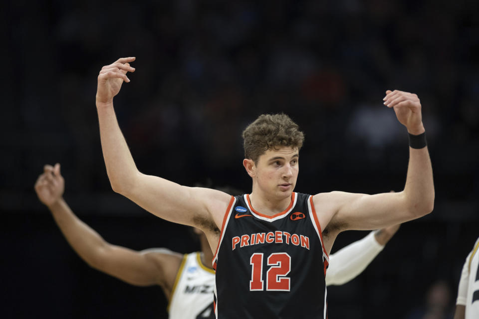 Princeton forward Caden Pierce (12) rallies the team during the second half of a second-round college basketball game against Missouri in the men's NCAA Tournament, Saturday, March 18, 2023, in Sacramento, Calif. Princeton won 78-63. (AP Photo/José Luis Villegas)