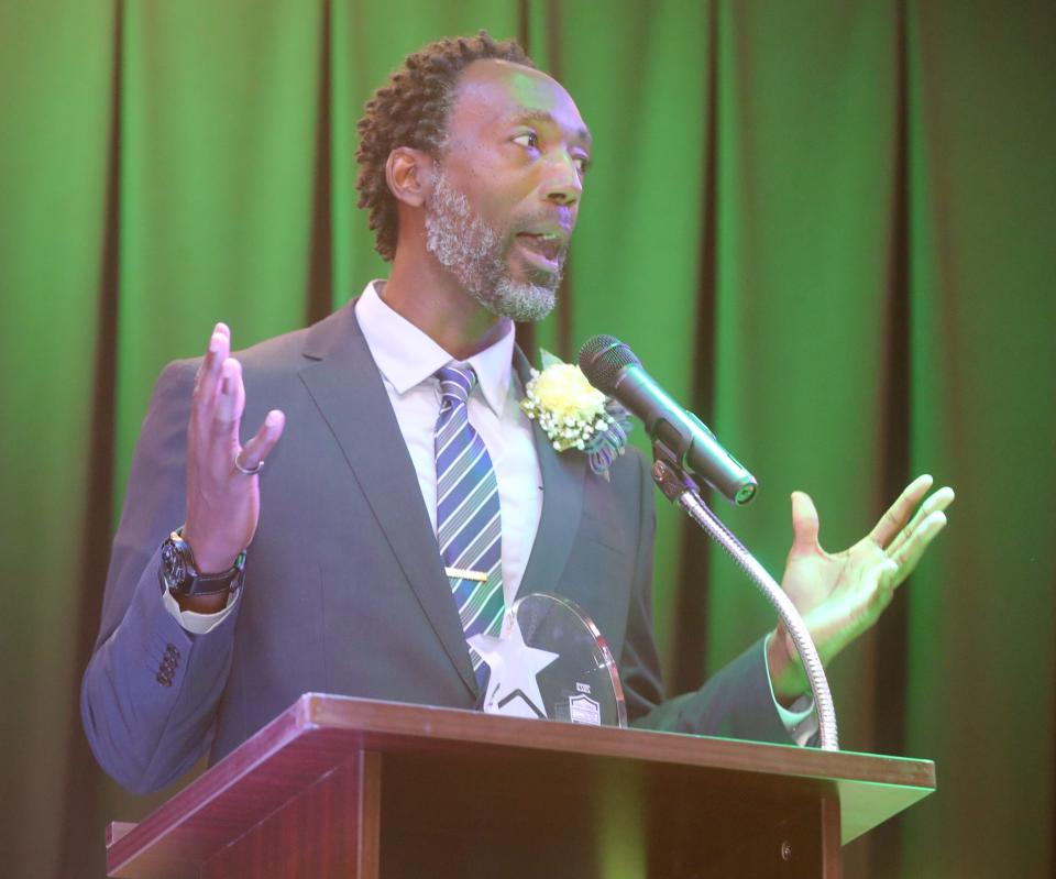 Summit County Sports Hall of Fame inductee Sean Robbins gives his speech during the banquet Tuesday at Annunciation Greek Orthodox Church in Akron.