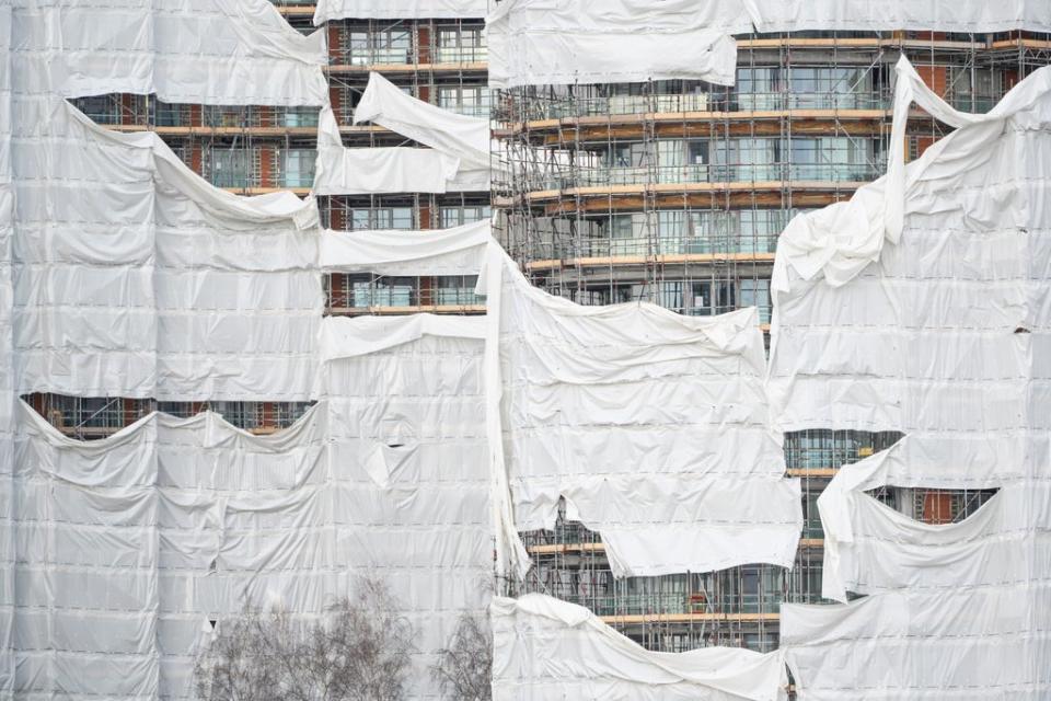 Wind damage to a construction site alongside the Thames, in London (Dominic Lipinski/PA) (PA Wire)