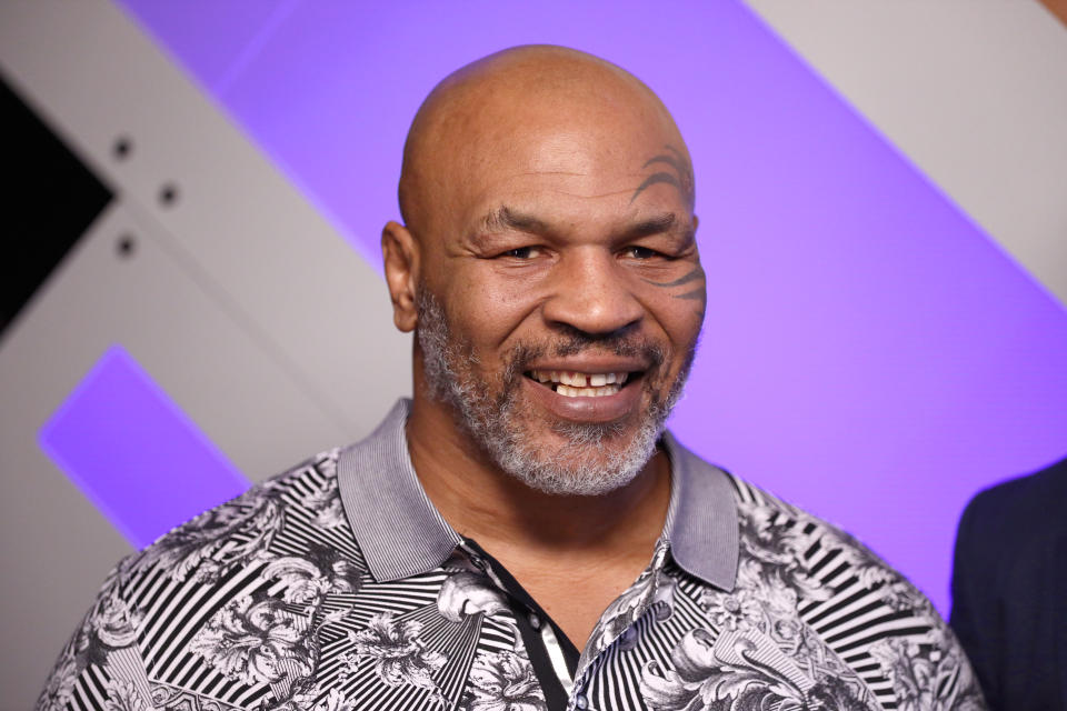 Mike Tyson speaks with Mario Lopez at Capital One Podcast Studio during the 2019 iHeartRadio Podcast Awards Presented by Capital One at the iHeartRadio Theater LA on Jan. 18, 2019 in Burbank, California.