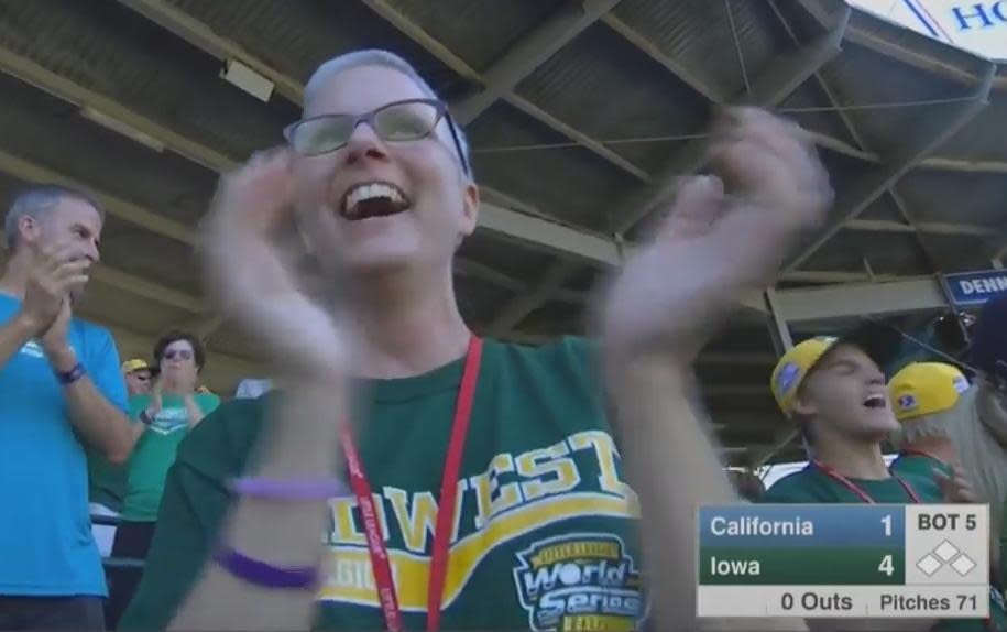 Jen Garcia cheers on her son JT after his home during Iowa's 4-1 win against California. (ESPN screen grab)