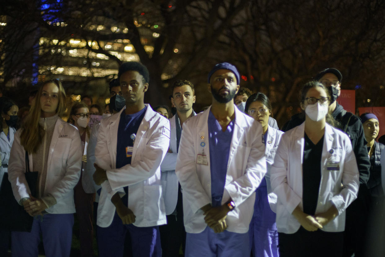 Brown University medical students attend an abortion rights rally in Providence, R.I., on Tuesday. (David Goldman/AP Photo)