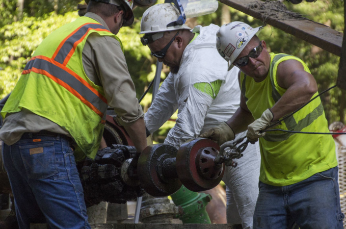Piedmont Natural Gas crews work on a maintenance site.