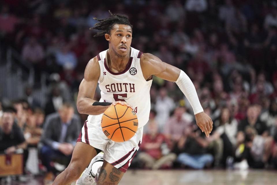 South Carolina guard Meechie Johnson dribbles the ball during the second half of the team's NCAA college basketball game against Alabama on Wednesday, Feb. 22, 2022, in Columbia, S.C. Alabama won 78-76 in overtime. (AP Photo/Sean Rayford)