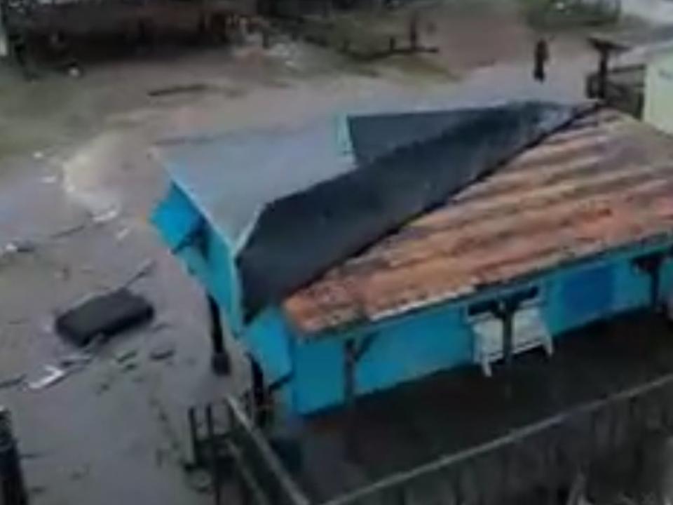 Footage showed houses with roofs blown off and flooding after storm Nicholas (TheWeatherChannel)