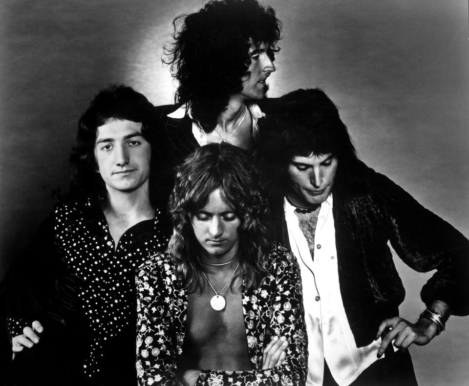 1975:  British rock band Queen (clockwise from top: Brian May, Freddie Mercury, Roger Taylor and John Deacon pose for an Electra Records publicity still to promote their album 'A Night at the Opera' in 1975.  (Photo by Michael Ochs Archives/Getty Images)