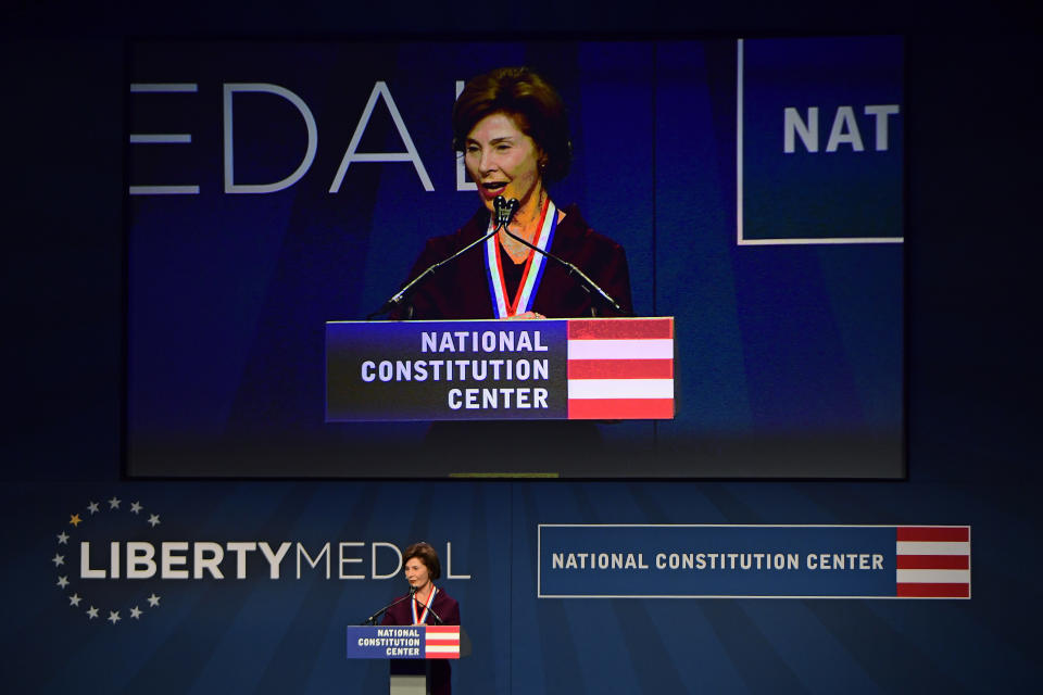 Former first lady Laura Bush speaks after receiving medals at the National Constitution Center in Philadelphia, Sunday, Nov. 11, 2018. She and her husband, former U.S. President George Bush, were bestowed with the 30th Annual Liberty Medal, an honor given to those who are committed to freedom and human rights globally. (AP Photo/Corey Perrine)