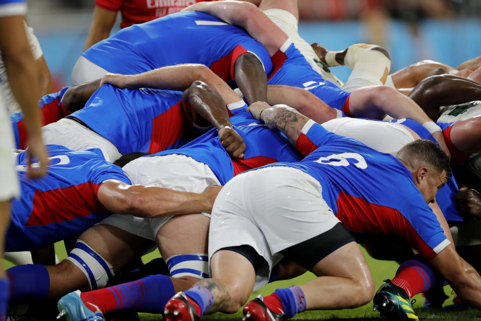 The Namibian scrum struggles to hold the South African scrum during the Rugby World Cup Pool B game at the City of Toyota Stadium between South Africa and Namibia in Toyota City, Japan, Saturday, Sept. 28, 2019. (AP Photo/Christophe Ena)