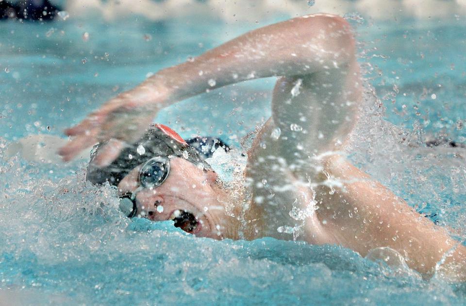 Glenwood High's Xavier Try swims the boys 200-yard freestyle relay during the Central State Eight Conference boys swimming and diving championship at Eisenhower Pool on Saturday, February 3, 2024.