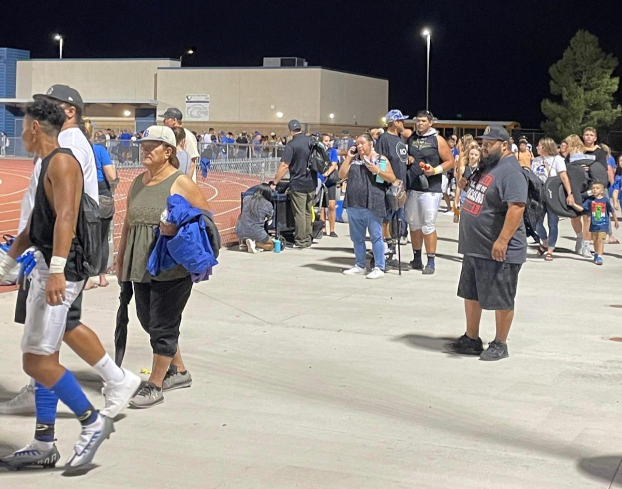 Visitors, players, coaches and students were moved to one end of the Silverado High School stadium in Victorville after shots rang out Friday night as a preseason scrimmage football game was ending.
