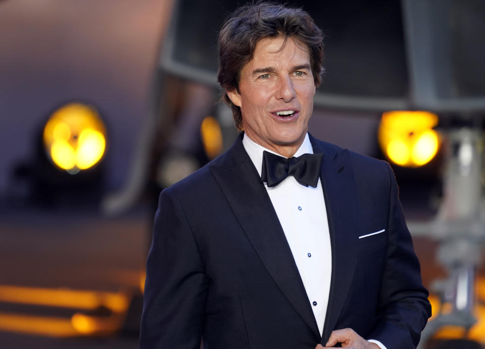 Tom Cruise poses for the media during the 'Top Gun Maverick' UK premiere at a central London cinema, on Thursday, May 19, 2022. (AP Photo/Alberto Pezzali)