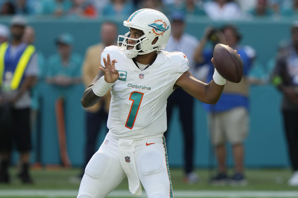 Miami Dolphins quarterback Tua Tagovailoa (1) aims a pass during the second half of an NFL football game against the Carolina Panthers, Sunday, Oct. 15, 2023, in Miami Gardens, Fla. (AP Photo/Lynne Sladky)