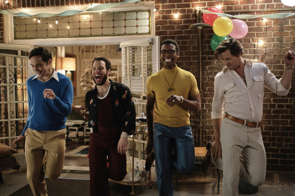 This image released by Netflix shows, from left, Jim Parsons, Robin De Jesus, Michael Benjamin Washington and Andrew Rannells in a scene from "The Boys in the Band." (Scott Everett White/Netflix via AP)