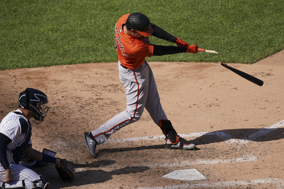 Baltimore Orioles' Ryan Mountcastle breaks his bat while hitting a double off New York Yankees relief pitcher Zack Britton in the eighth inning of a baseball game, Saturday, Sept. 12, 2020, in New York. (AP Photo/John Minchillo)