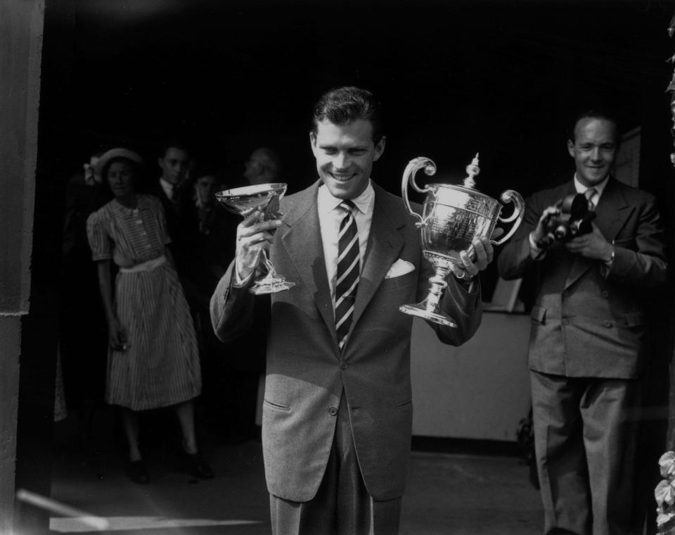 Budge Patty with his men's singles trophy at Wimbledon, July 7 1950 - Reg Speller/Fox Photos/Getty