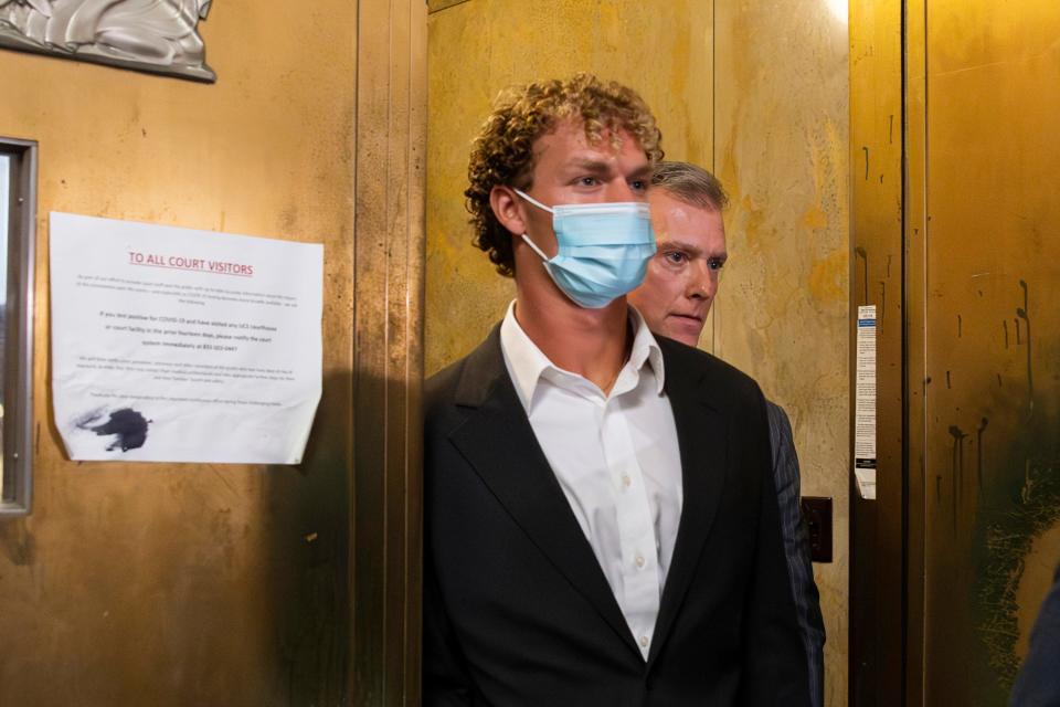 Daniel Penny leaves Manhattan Criminal Court on Friday, May 12, 2023, in New York.  Penny, 24, a U.S. Marine Corps veteran, appeared in court hours after turning himself in at a police station after prosecutors said they were charging him in connection with the May 1 death of Jordan Neely.