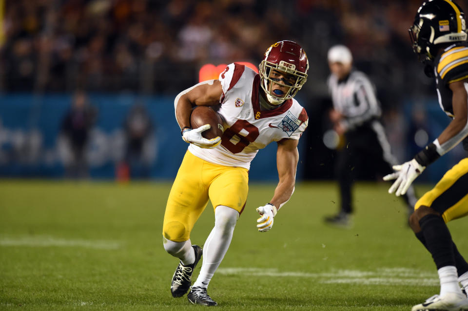 SAN DIEGO, CA - DECEMBER 27: USC Trojans wide receiver Amon-Ra St. Brown (8) runs the ball during the Holiday Bowl game between the USC Trojans and the Iowa Hawkeyes on December 27, 2019, at SDCCU Stadium in San Diego, CA. (Photo by Chris Williams/Icon Sportswire via Getty Images)