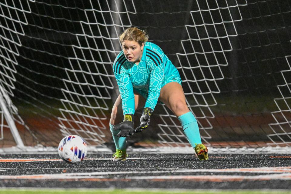 Cincinnati Country Day goalkeeper Alyssa Easter (1) makes a save at the Division III state semifinal game between Cincinnati Country Day and Madeira at Loveland Tuesday, Nov. 7, 2023.