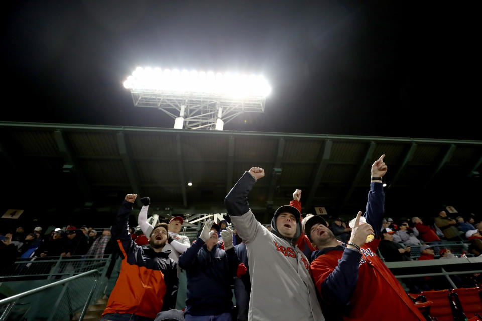 BOSTON, MA – OCTOBER 23: Fans celebrate a three-run home run by Eduardo Nunez during the seventh inning against the Los Angeles Dodgers in Game One of the 2018 World Series. (Photo by Al Bello/Getty Images)