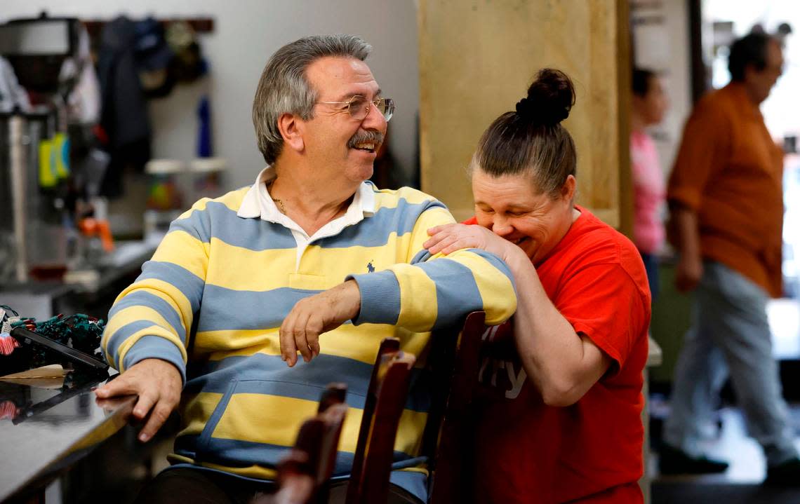 Employee Wendy Shaw laughs with Panagiotis “Pete” Kakouras while working at Pete’s Family Restaurant in Carthage, N.C., on Wednesday, Dec. 7, 2022.