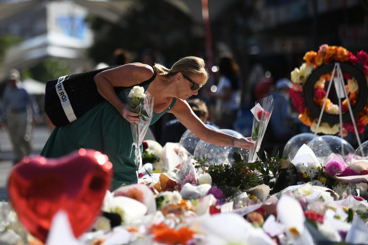 Flowers laid outside Westfield Bondi Junction shopping centre after Saturday’s attack (EPA)