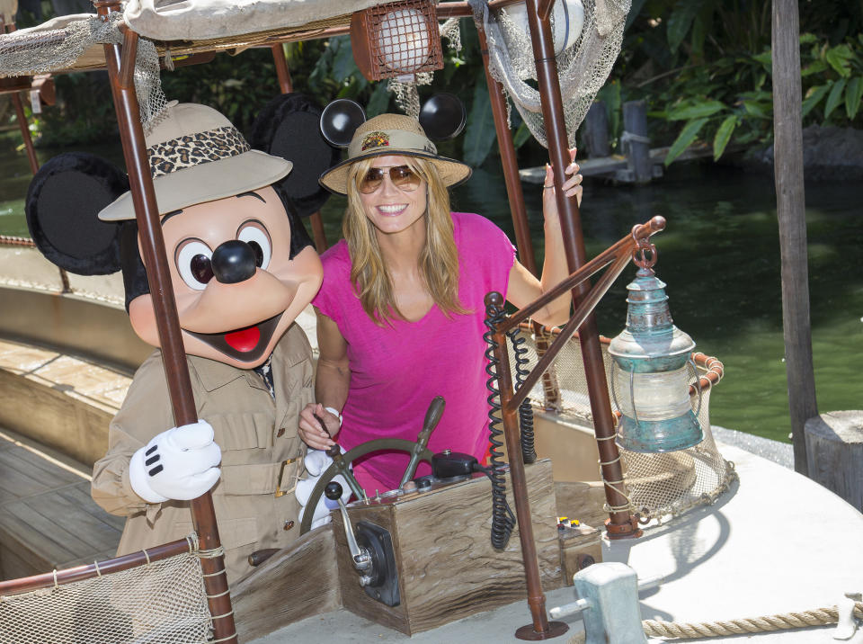 <p>ANAHEIM, CA - MAY 28: In this handout photo provided by Disney Parks, Heidi Klum joins Mickey Mouse aboard the world-famous Jungle Cruise attraction May 28, 2014 at Disneyland in Anaheim, California. (Photo by Paul Hiffmeyer/Disney Parks via Getty Images)</p>
