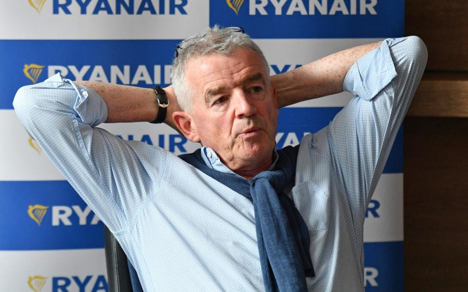 Ryanair chief Michael O'Leary gestures during a press conference in London, 2021