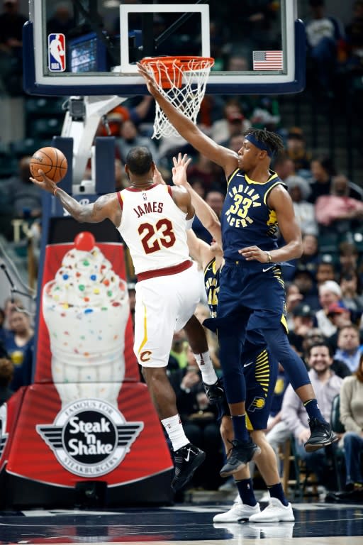 Myles Turner of the Indiana Pacers defends the shot of LeBron James of the Cleveland Cavaliers at Bankers Life Fieldhouse