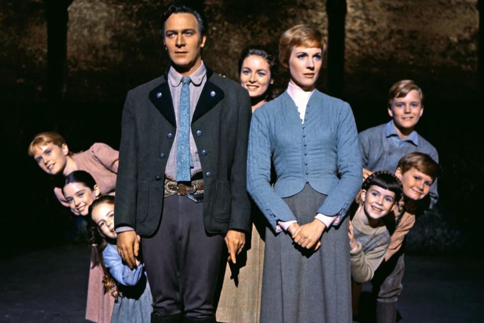 Julie Andrews and Christopher Plummer are flanked on all sides by their children, all members of the singing Von Trapp family, in this publicity handout from the 1965 adaption of the Rogers and Hammerstein musical, The Sound of Music.