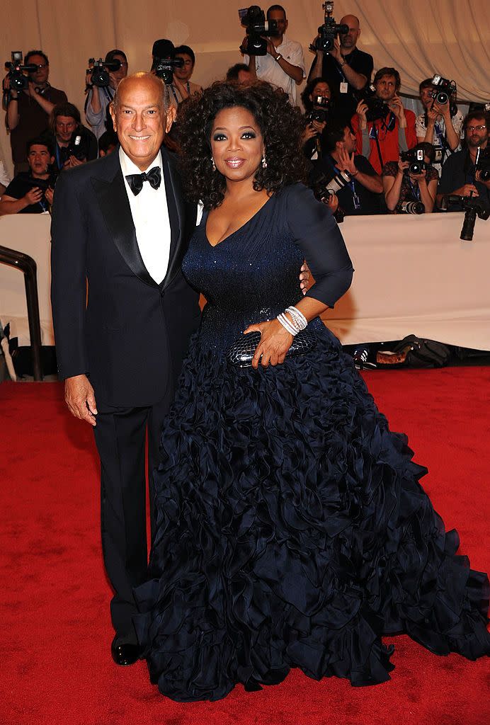<p>Attending with the man himself, Oprah made her Met Gala debut in a sill ruched navy gown by Oscar de La Renta in 2010.</p>