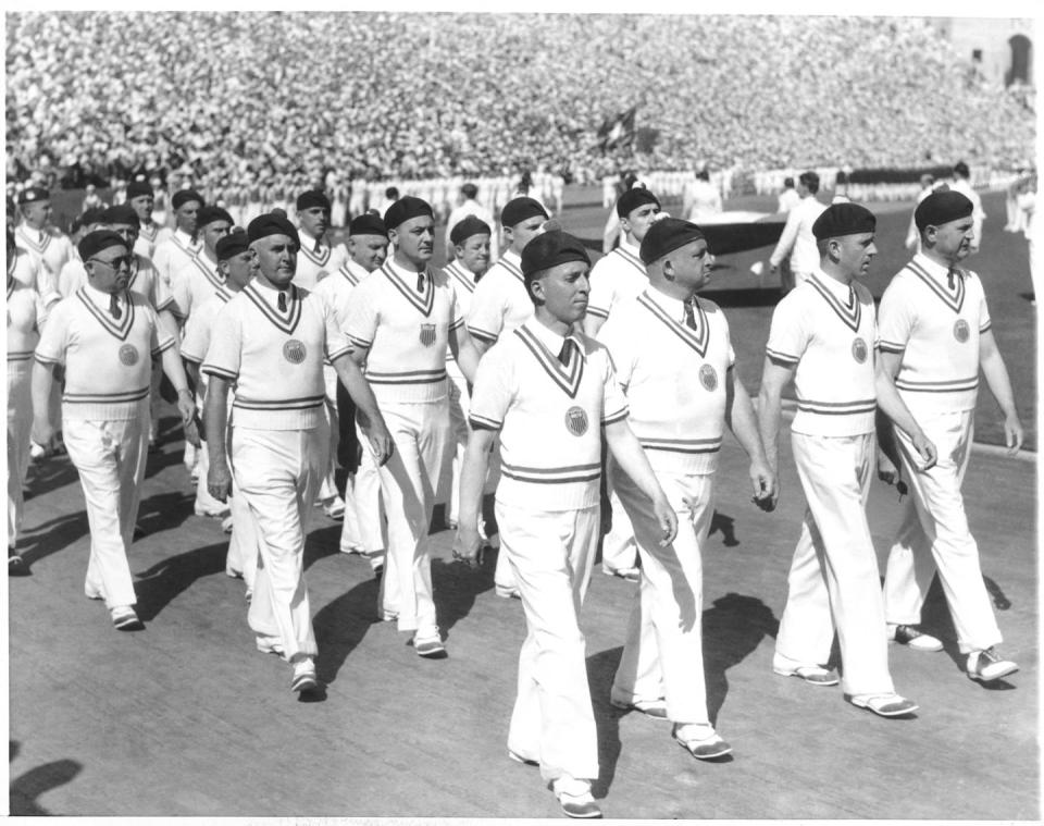 <p>American athletes wear berets and knit sweaters as they lead the opening ceremony as the host country. The 1932 Summer Olympic Games in Los Angeles marked the first time the West Coast city would host the games. </p>