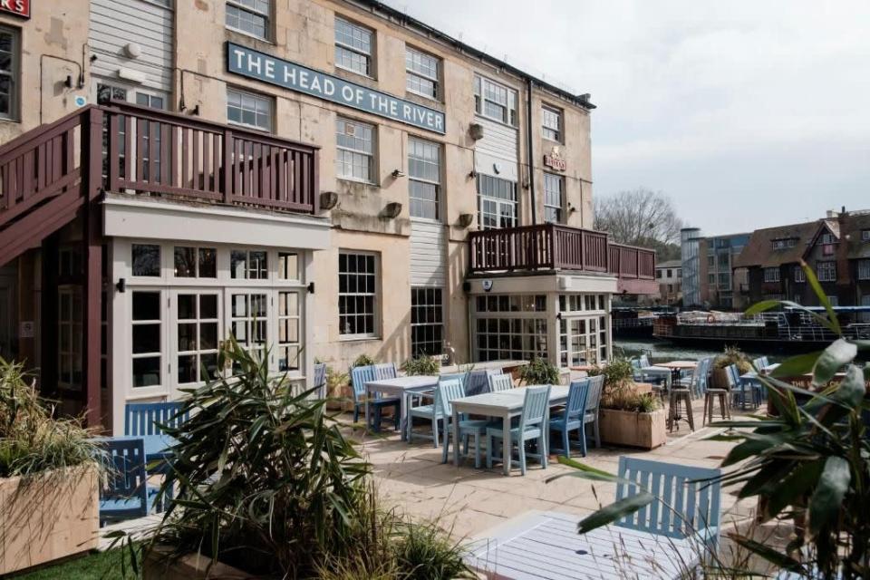 <p>This riverside hotel is the ideal place to soak up the atmosphere of one of the world’s most famous universities. Oxford and Cambridge’s famous boat race inspires much of the décor inside <a href="https://www.booking.com/hotel/gb/head-of-the-river.en-gb.html?aid=2070929&label=riverside-hotels" rel="nofollow noopener" target="_blank" data-ylk="slk:The Head of the River" class="link ">The Head of the River</a>, with faux bookcases and framed novels continuing the academic theme, and exposed brickwork and wooden floors adding a modern touch.</p><p>Kids are welcome, so the whole family can enjoy a short punt up the river to explore the city centre. Once you’ve worked up an appetite try the pub’s tasty seasonal dishes, or head out onto the terrace - one of Oxford’s most popular places for a drink thanks to its scenic location and great selection of beers and wines, plus a full gin list.</p><p><a class="link " href="https://www.redescapes.com/offers/oxford-head-of-the-river-hotel" rel="nofollow noopener" target="_blank" data-ylk="slk:READ OUR REVIEW">READ OUR REVIEW</a></p><p><a class="link " href="https://www.booking.com/hotel/gb/head-of-the-river.en-gb.html?aid=2070929&label=riverside-hotels" rel="nofollow noopener" target="_blank" data-ylk="slk:CHECK AVAILABILITY">CHECK AVAILABILITY</a></p>