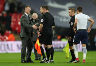 Soccer Football - FA Cup Fourth Round Replay - Tottenham Hotspur vs Newport County - Wembley Stadium, London, Britain - February 7, 2018 Newport County manager Mike Flynn shakes hands with referee Stuart Attwell after the match Action Images via Reuters/Peter Cziborra