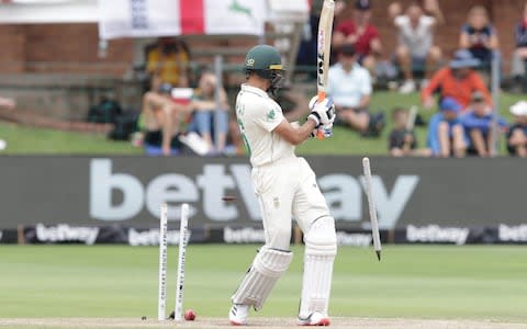 South Africa's Keshav Maharaj is bowled by England's Stuart Broad during the fourth day of the third Test cricket match between South Africa and England at the St George's Park Cricket Ground in Port Elizabeth - Credit: &nbsp;RICHARD HUGGARD/AFP via Getty Images