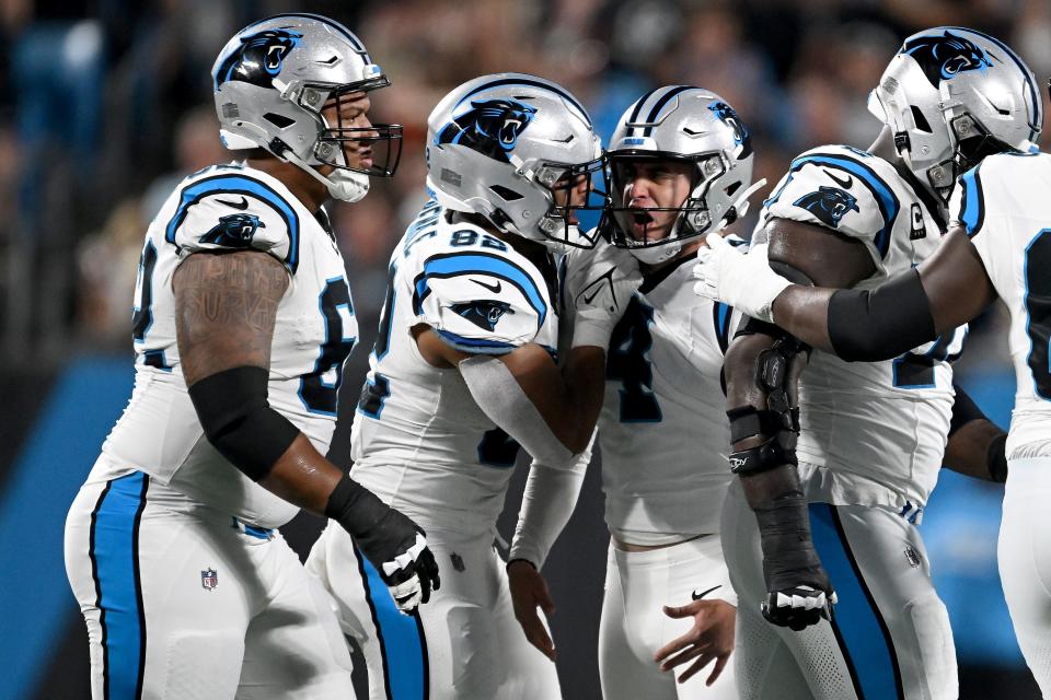 CHARLOTTE, NORTH CAROLINA - SEPTEMBER 18: Eddy Pineiro #4 of the Carolina Panthers celebrates with his teammates after maki ng a field goal during the third quarter in the game at Bank of America Stadium on September 18, 2023 in Charlotte, North Carolina. (Photo by Grant Halverson/Getty Images)