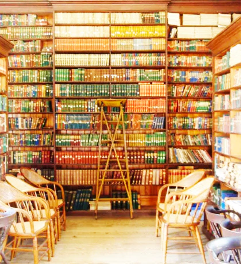 The library interior of Thomas Hughes Public Library in Rugby. which holds about 7,000 books. Hughes’ 1857 children’s novel, “Tom Brown’s School Days,” is prominently displayed in the library.