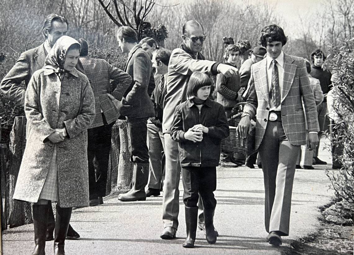 Mike Lubbock, right, walks with the royal family in the 1970s when he was a curator at the Wildfowl and Wetlands Trust, a reserve in Slimbridge, England.