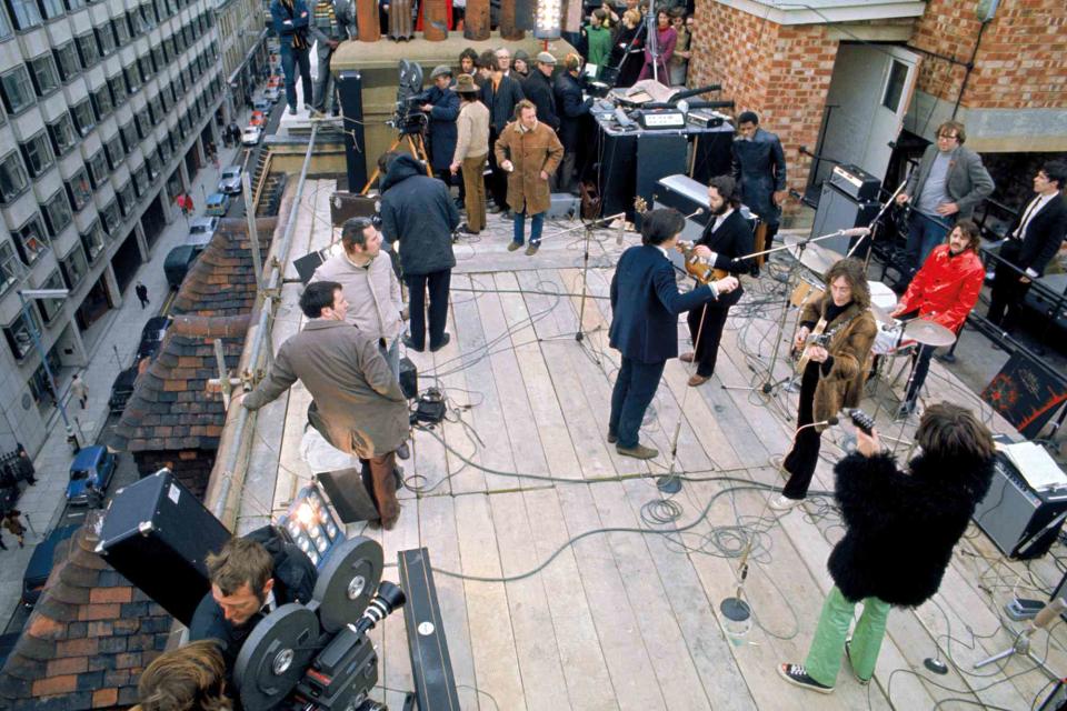 Ethan A. Russell / Â© Apple Corps Ltd. The Beatles and film crew in January 1969